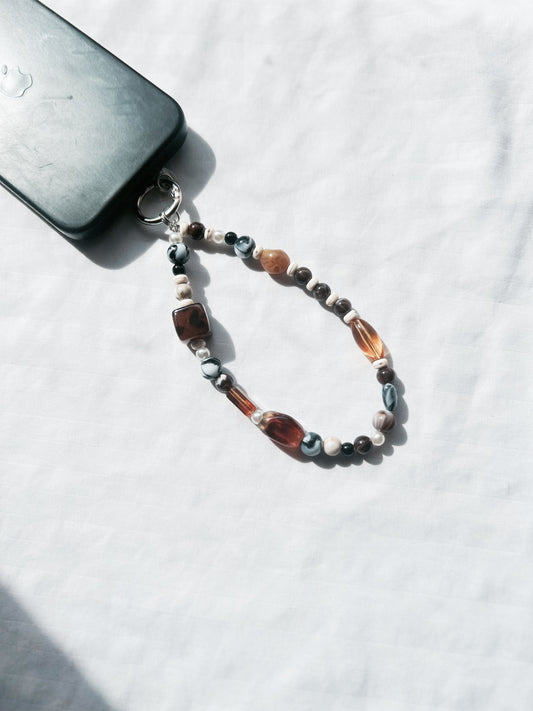 Terra Mood – Lanière de téléphone ambre & marbré